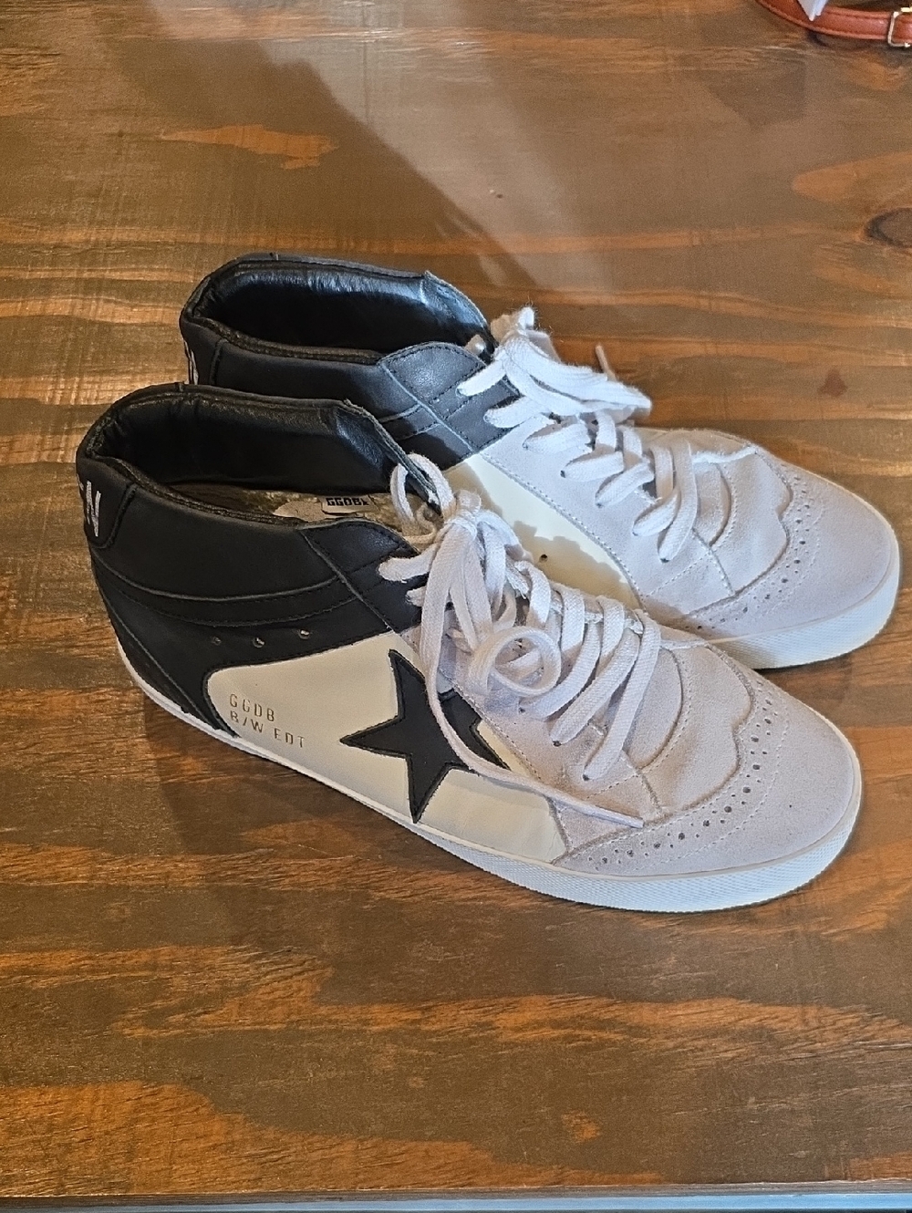Golden Goose Black and White Mid-Top Sneakers with Star